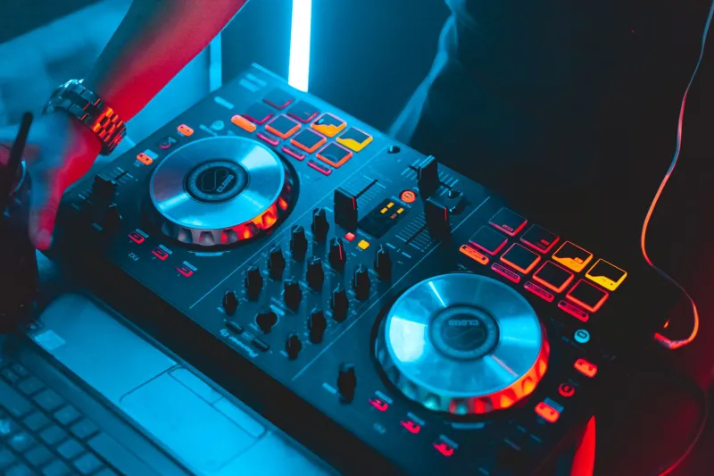 The Invisible DJ in the Machine: How Playlist Curators Became Rock's New Overlords